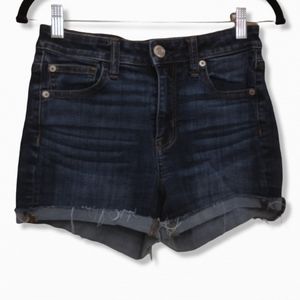 AEO hi-rise shortie dark blue wash denim shorts. Distressed hem size 4